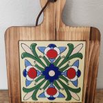 floral wooden hot pad with folk art tile inlay